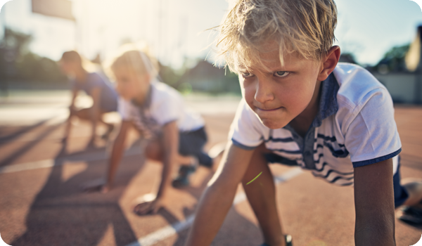 Young runner at the starting line, representing focused growth and disciplined ETF investing through Fixed Income ETF (TPFI) and biblically responsible investing.