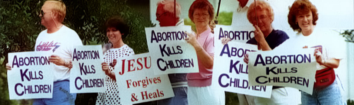 Christians for the sanctity of life stand in line with signs for ProLife
